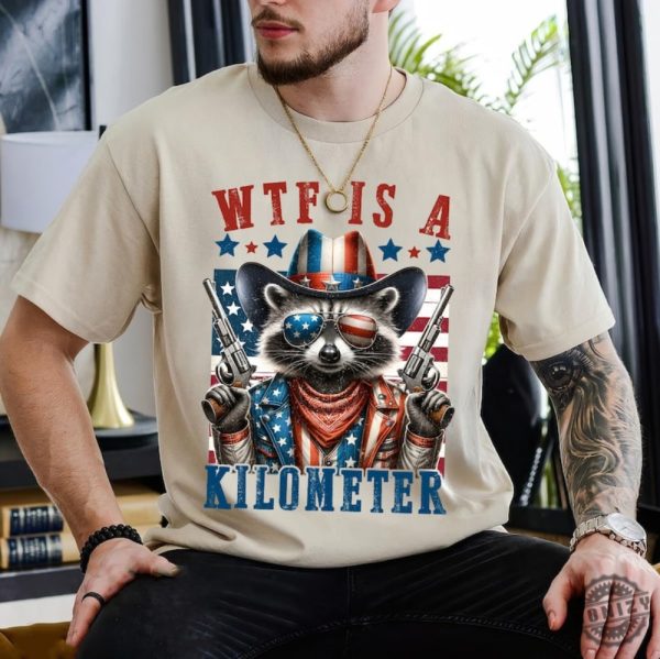Retro Wtf Is A Kilometer Raccoon Funny Usa Flag Funny Gamer Shirt honizy 1