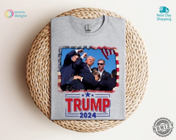 Trump Shooting Shirt Donald Trump President 2024 Unstoppable Hoodie President Trump 47 Shot At Rally Fist In The Air Sweatshirt Take America Back Tshirt Trump Shirt honizy 1