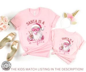 Santa Is A Swiftie Pink Sweatshirt Merry Swiftmas Hoodie Ts Gift Fan Music Fan Christmas Gift Gift For Swiftie Tshirt Taylor Album Merch honizy 2