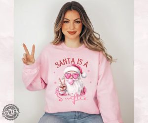 Santa Is A Swiftie Pink Sweatshirt Merry Swiftmas Hoodie Ts Gift Fan Music Fan Christmas Gift Gift For Swiftie Tshirt Taylor Album Merch honizy 3