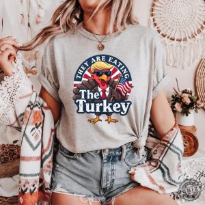 They Are Eating Turkey Trump Shirt Funny Thankgiving Turkey Hoodie Funny Donald Trump Thanksgiving Sweatshirt Inauguration 47Th Us President Gift honizy 2