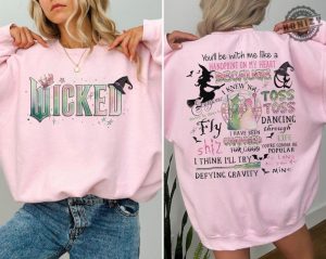 Wicked Movie 2Sided Shirt Defy Gravity Broomstick Magic Wand Sweatshirt Witch Pink And Green Tshirt Wizard Movie Fan Tee Wizard Hoodie honizy 3